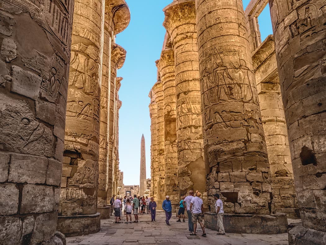 Ancient columns and hieroglyphs at Karnak Temple in Luxor, Egypt